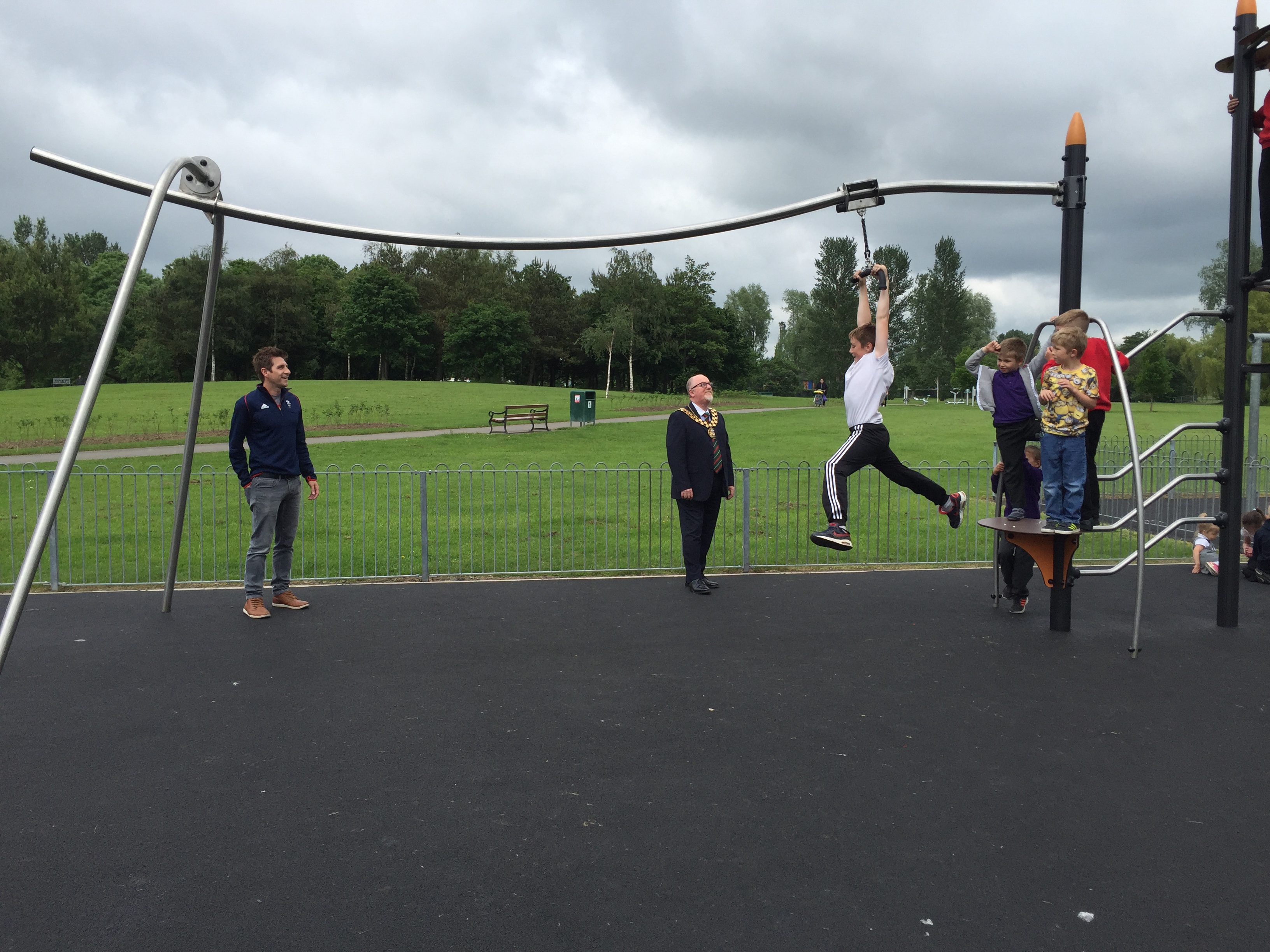 Boy Using Proludic Adventure Play Equipment At West Park Opening