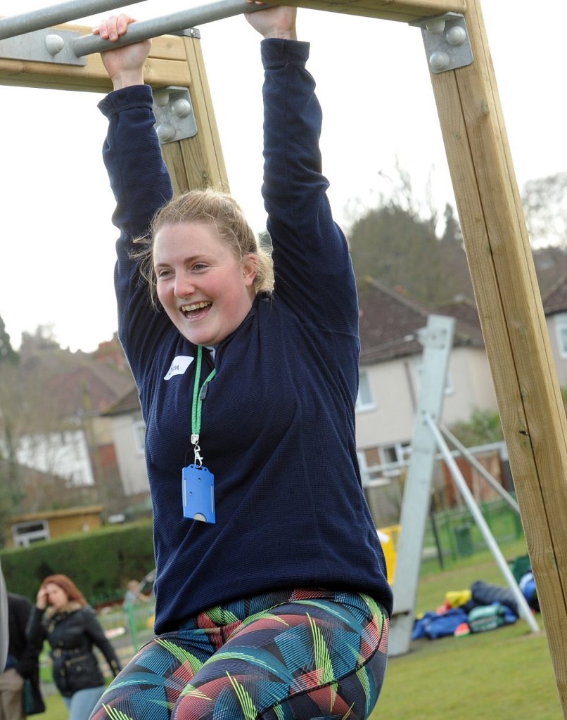 HarpendenTownCouncil Picture 3 Young Adult Girl Playing on Proludic Outdoor Gym Equipment