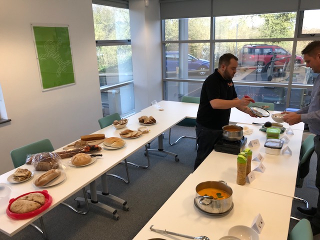 Proludic's own soup kitchen set up including a selection of different bread and red pepper and roasted tomato soup