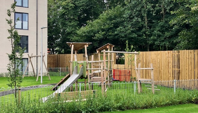 Playground structure in housing development garden