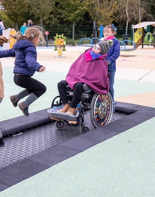 Wheelchair accessible in ground trampoline strip