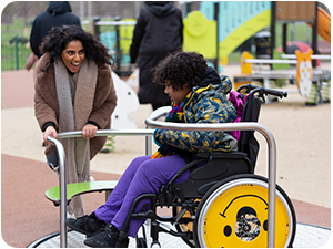 Wheelchair-accessible inclusive play equipment